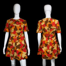 Load image into Gallery viewer, A mannequin wearing a colorful patterned dress against a white background