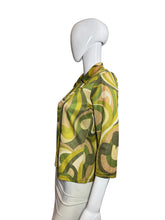 Load image into Gallery viewer, Mannequin wearing a green and beige patterned skirt on a plain background