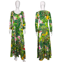 Load image into Gallery viewer, Green floral Jumpsuit on a mannequin against a white wall