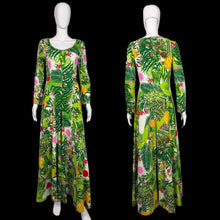 Load image into Gallery viewer, Green floral Jumpsuit on a mannequin against a white wall
