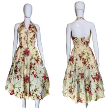 Load image into Gallery viewer, Floral dress on a mannequin with a plain background