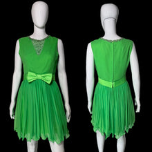 Load image into Gallery viewer, A bright green sleeveless dress displayed on a white mannequin, shown from both the front and back views.