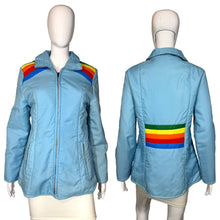 Load image into Gallery viewer, Blue jacket with rainbow stripes on a mannequin against a plain background