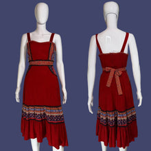 Load image into Gallery viewer, Red dress with patterned layers on a white mannequin against a plain background