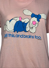 Load image into Gallery viewer, Pink t-shirt with cartoon character and text on a mannequin