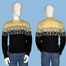 Load image into Gallery viewer, Black sweater with geometric pattern worn by a mannequin on a plain background