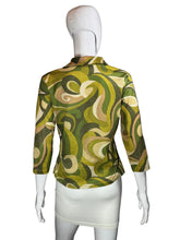 Load image into Gallery viewer, Mannequin wearing a green and beige patterned skirt on a plain background
