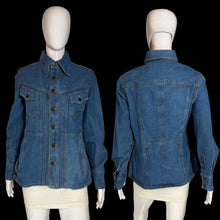 Load image into Gallery viewer, Blue denim jacket displayed on a mannequin from front and back views against a neutral background.