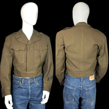 Load image into Gallery viewer, Green WWII army jacket and blue jeans on a mannequin against a plain background