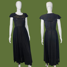 Load image into Gallery viewer, Black dress on a mannequin against a plain background