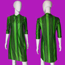 Load image into Gallery viewer, A green and black vertically striped dress displayed on a white mannequin, showing both front and back views.
