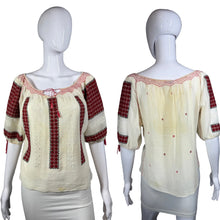 Load image into Gallery viewer, White peasant blouse with red accents on a mannequin against a white background