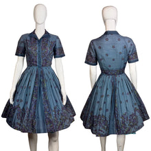 Load image into Gallery viewer, Blue patterned A-line dress on a mannequin against a neutral background