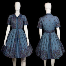 Load image into Gallery viewer, Blue patterned A-line dress on a mannequin against a neutral background