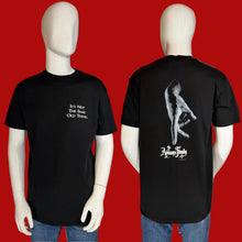 Load image into Gallery viewer, Black t-shirt with text and graphic design on a mannequin, shown from front and back.
