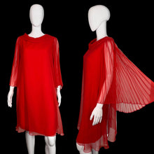 Load image into Gallery viewer, Red dress with sheer sleeves on a mannequin against a plain background
