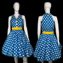 Load image into Gallery viewer, Blue polka dot dress with a yellow belt on a mannequin against a neutral background