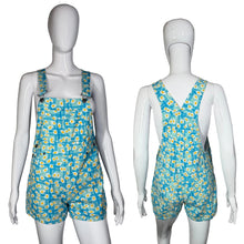 Load image into Gallery viewer, Blue floral overalls on a mannequin against a white background