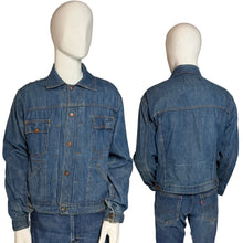 Load image into Gallery viewer, Blue denim jacket displayed on a mannequin with front and back views against a plain background.