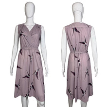 Load image into Gallery viewer, Purple dress with bird pattern on a mannequin against a plain background