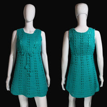 Load image into Gallery viewer, Teal crochet dress on a mannequin against a neutral background.