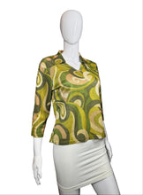 Load image into Gallery viewer, Mannequin wearing a green patterned skirt on a white background