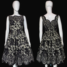 Load image into Gallery viewer, Black lace dress on a mannequin