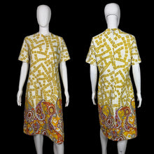 Load image into Gallery viewer, Yellow and white patterned dress on a mannequin