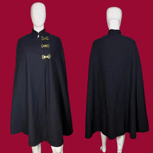 Load image into Gallery viewer, Navy blue cape with gold buckles on a mannequin against a plain background