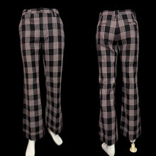 Load image into Gallery viewer, Black and white plaid pants on a mannequin against a plain background