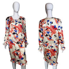 Load image into Gallery viewer, Floral dress on a mannequin against a plain background