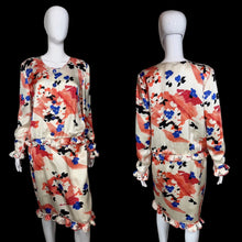 Load image into Gallery viewer, Floral dress on a mannequin against a plain background
