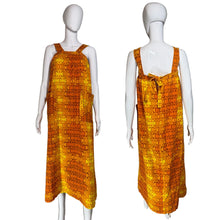 Load image into Gallery viewer, Orange patterned dress on a mannequin with front and back views against a plain background.