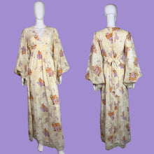 Load image into Gallery viewer, Floral dress on a mannequin against a plain background