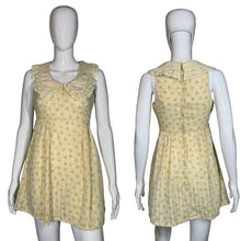 Load image into Gallery viewer, Yellow floral dress on a mannequin