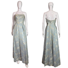 Load image into Gallery viewer, Mannequins wearing strapless floral dresses on a white background