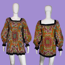 Load image into Gallery viewer, Colorful patterned dress on a mannequin against a plain background