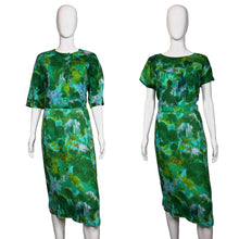 Load image into Gallery viewer, Green patterned dress on a white mannequin against a plain wall with and without matching jacket.