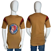 Load image into Gallery viewer, Brown t-shirt with graphic design on a mannequin against a gray background