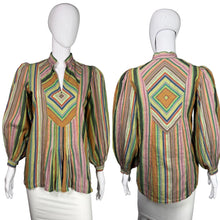 Load image into Gallery viewer, Multicolored striped shirt on a mannequin with front and back views.