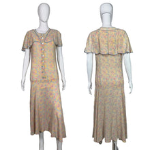 Load image into Gallery viewer, Floral dress on a mannequin against a plain background