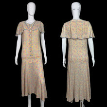 Load image into Gallery viewer, Floral dress on a mannequin against a plain background
