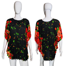 Load image into Gallery viewer, Black dress with red floral pattern on mannequins
