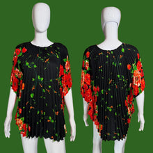 Load image into Gallery viewer, Black dress with red floral pattern on mannequins