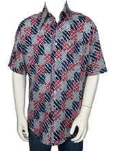Load image into Gallery viewer, Mannequin wearing a patterned shirt with red and blue geometric design on a plain background