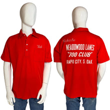 Load image into Gallery viewer, Red polo shirt with text on a mannequin, front and back views.