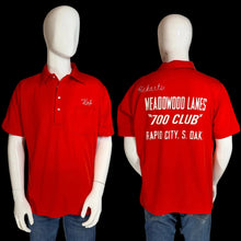 Load image into Gallery viewer, Red polo shirt with text on a mannequin, front and back views.