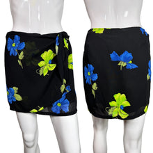 Load image into Gallery viewer, Black skirt with blue and green floral pattern on a mannequin against a plain background