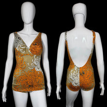 Load image into Gallery viewer, Orange and beige floral-patterned bathing suit on a mannequin