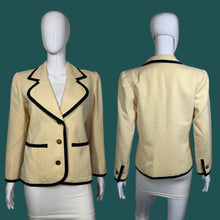 Load image into Gallery viewer, Beige blazer with black trim on a mannequin against a gray background